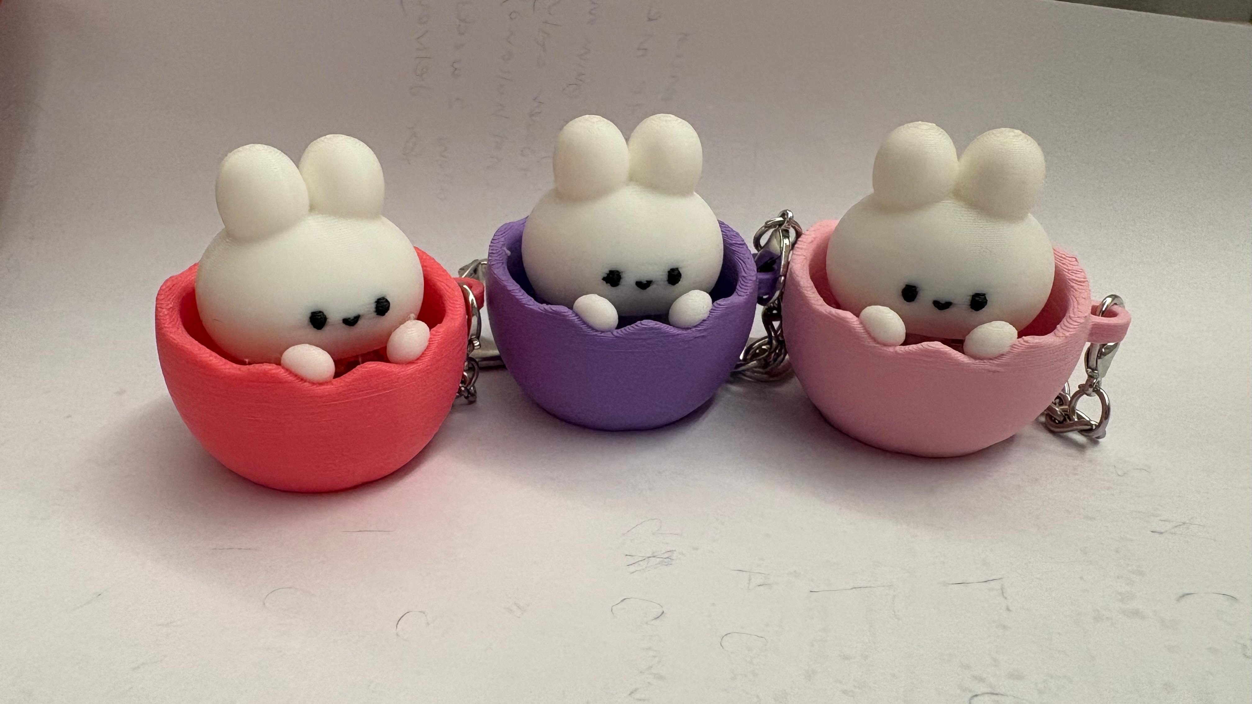 Bunny keychains in red, purple and pink